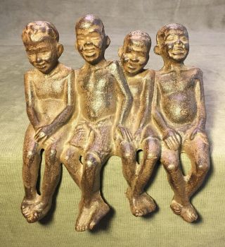 Rare Antique Black Americana Cast Iron 4 Boys Sitting Laughing Shelf Sitter